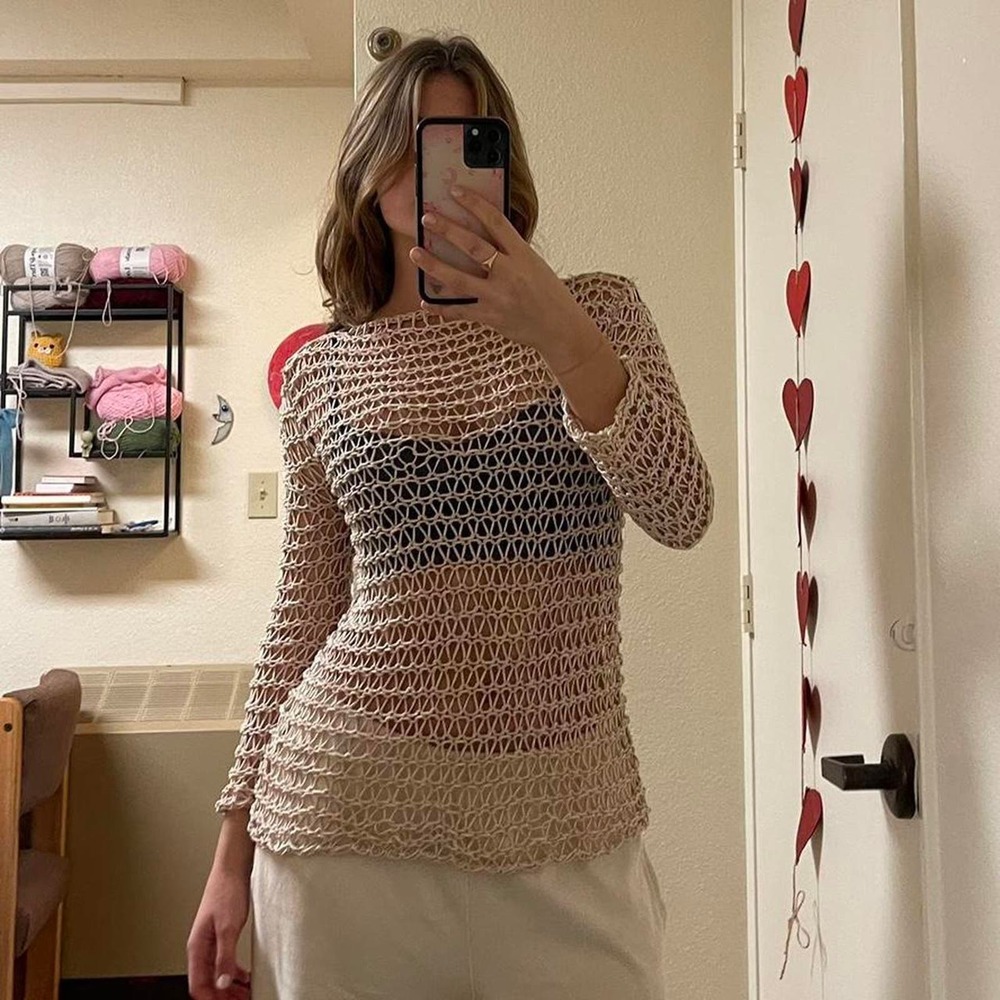 The vintage cream knit sweater
